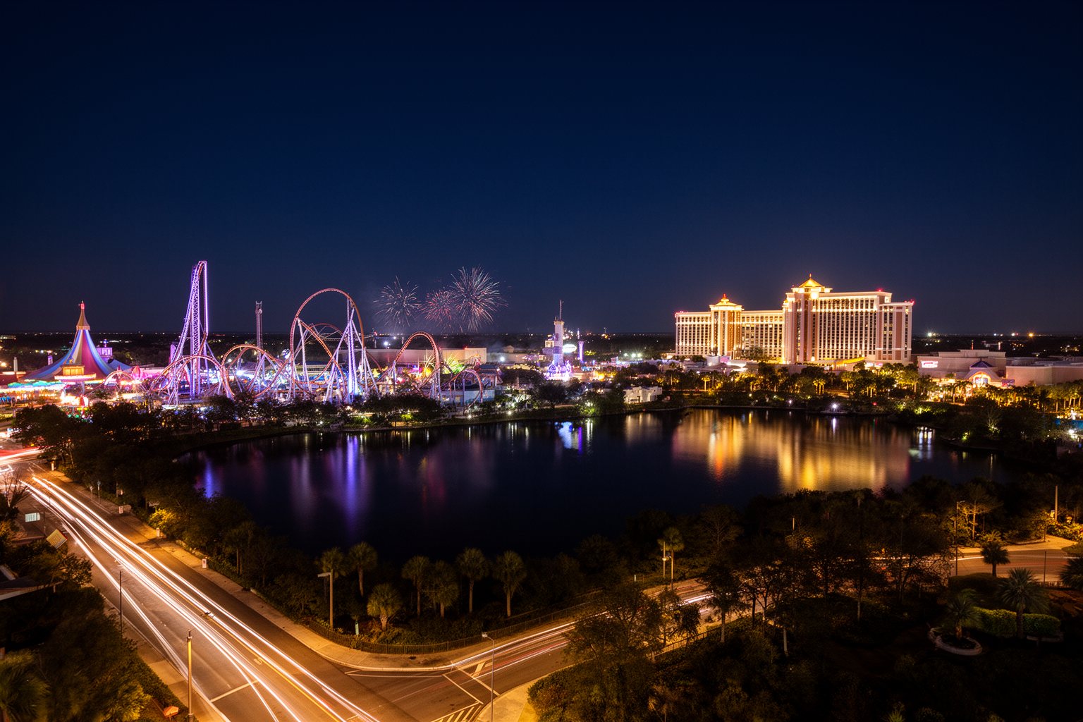 Universal Studios Orlando Nightlife: Rides, Shows and Eats Night view across Universal Orlando's lit rides, lagoon and hotels