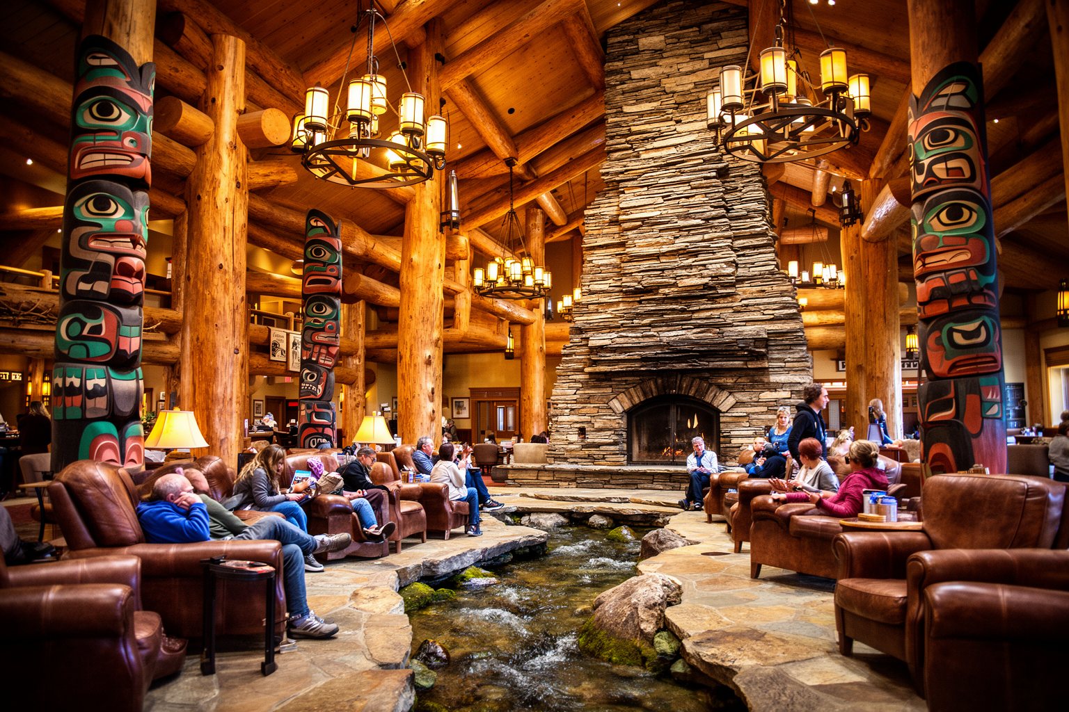 Discover the Magic: Top 10 Disney World Orlando Hotels You Must Visit! Log beams and a towering stone fireplace in the lobby of Disney's Wilderness Lodge