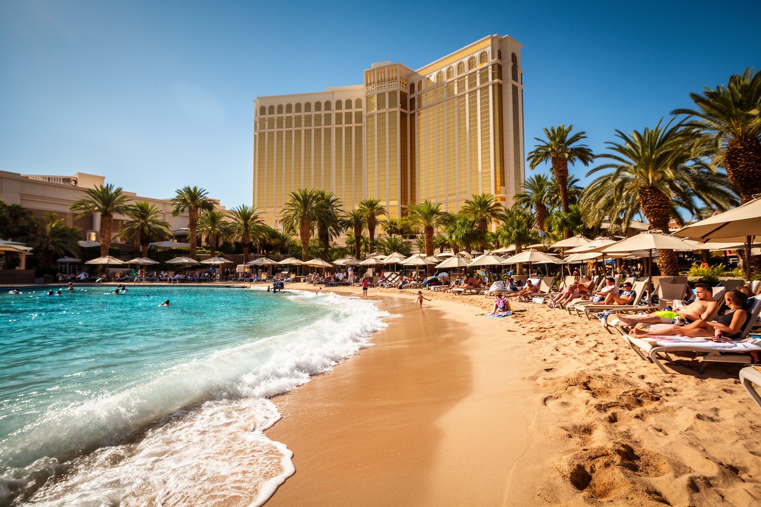 Your Family’s Perfect Home Base: Child-Friendly Hotels in Vegas Families relaxing at the sand beach and wave pool of Mandalay Bay in Las Vegas