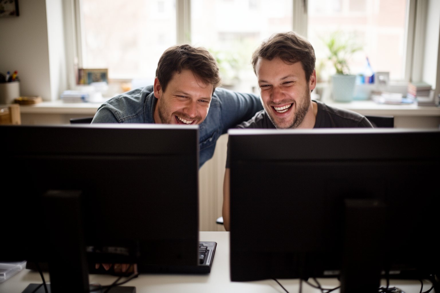 Minecraft vs Roblox: The Ultimate Showdown Two players comparing different blocky online games on side-by-side monitors