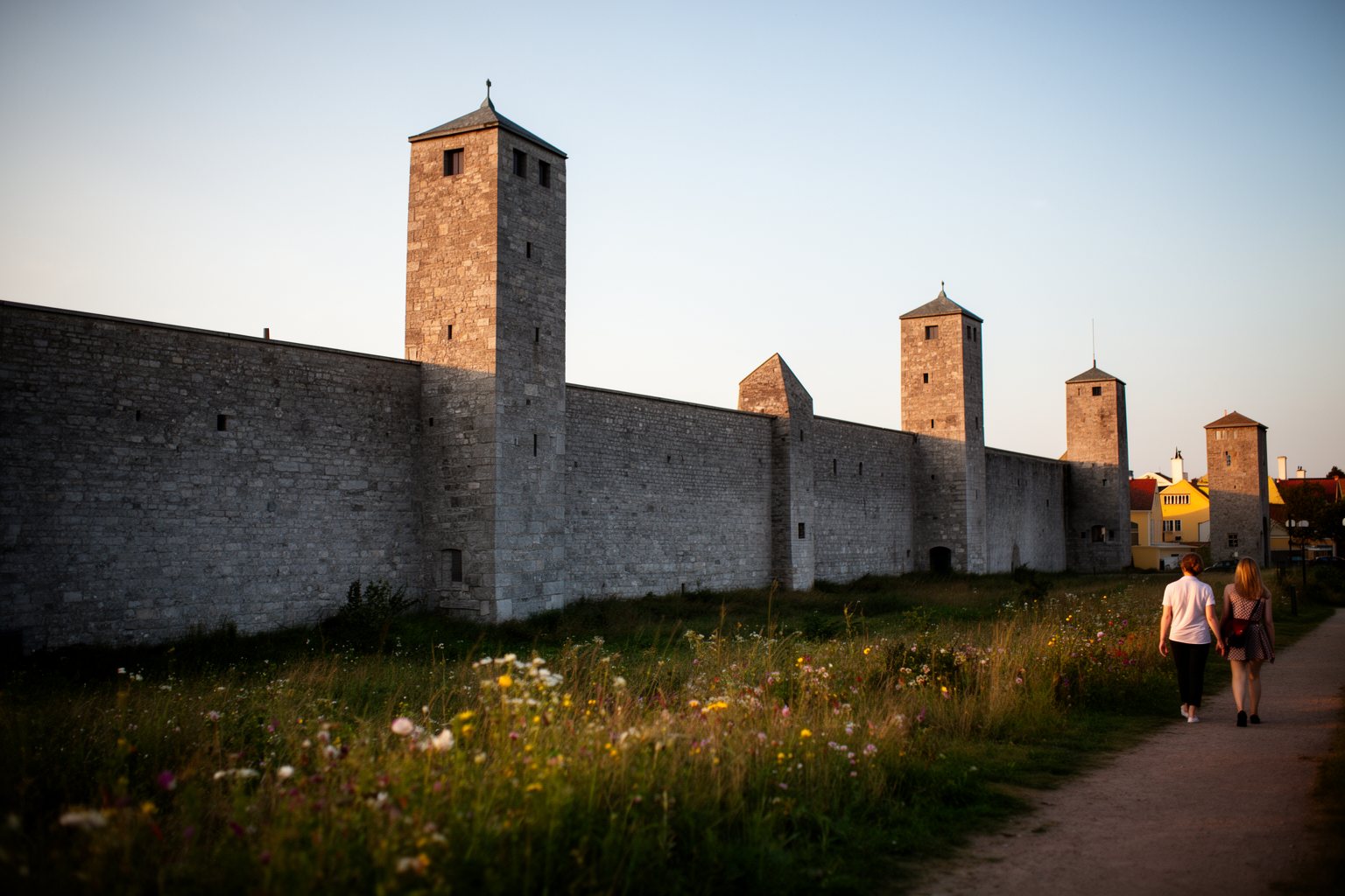 10 Unmissable Historical Sites in Europe You Didn't Know Existed! Medieval stone town wall and towers of Visby on Gotland, Sweden, on a summer evening